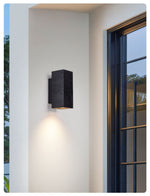 Volkris Black Travertine Wall Sconce — Modern Stone Architectural Lighting