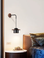 Vulna Wall Sconce in Black Travertine with Walnut Accent
