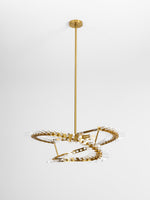 Waltz Art Chandelier – Sculptural Gold Pendant Light for Modern Interiors