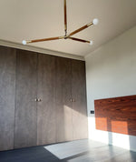 Wrapped Linear Chandelier in Brass and Leather – Modern Mid-Century Pendant Light