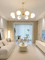 Yisu Brass Chandelier – Vintage Glass Globe Pendant Light for Modern Interiors