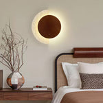 Crescent Halo Plug-In Wall Sconce in Natural Travertine and Wood