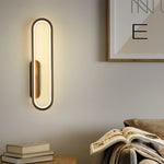 Modern Minimalist Oval LED Wall Sconce with Warm Ambient Glow