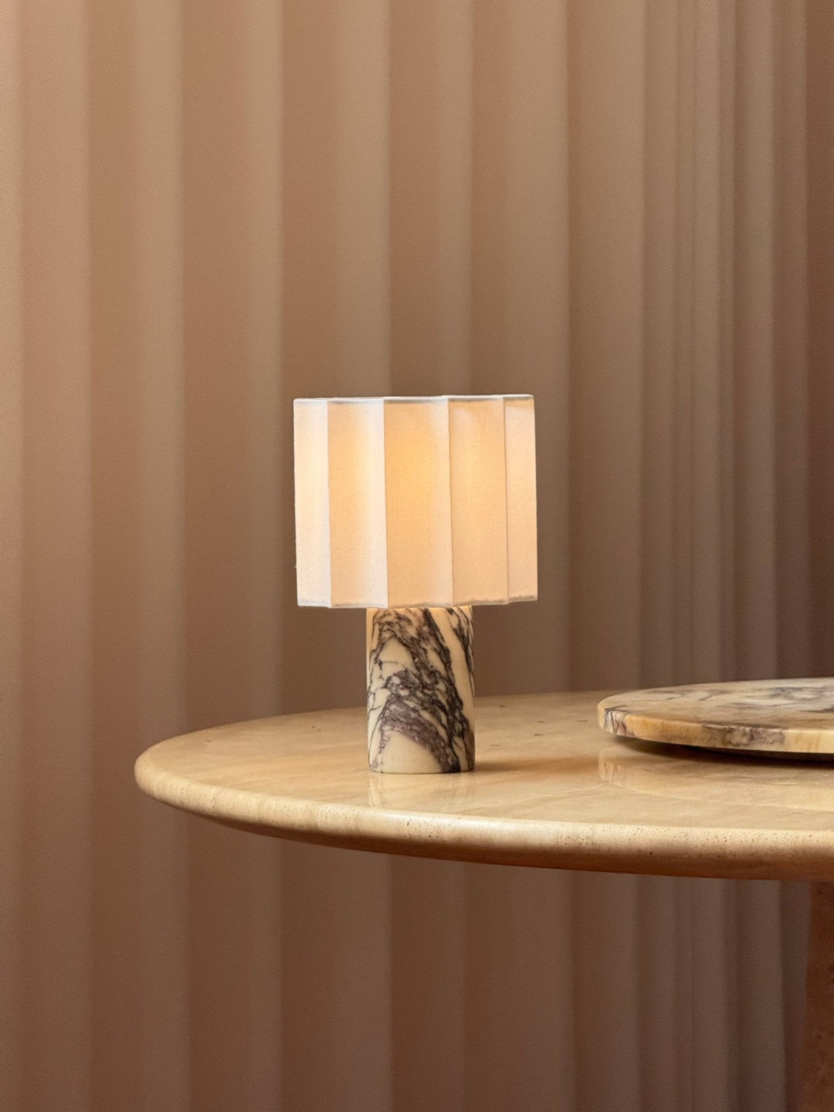 Orbis Veil Table Lamp – Sculptural Marble LED Lamp with Pleated Fabric Shade