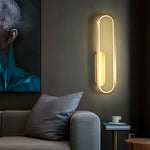 Modern Minimalist Oval LED Wall Sconce with Warm Ambient Glow
