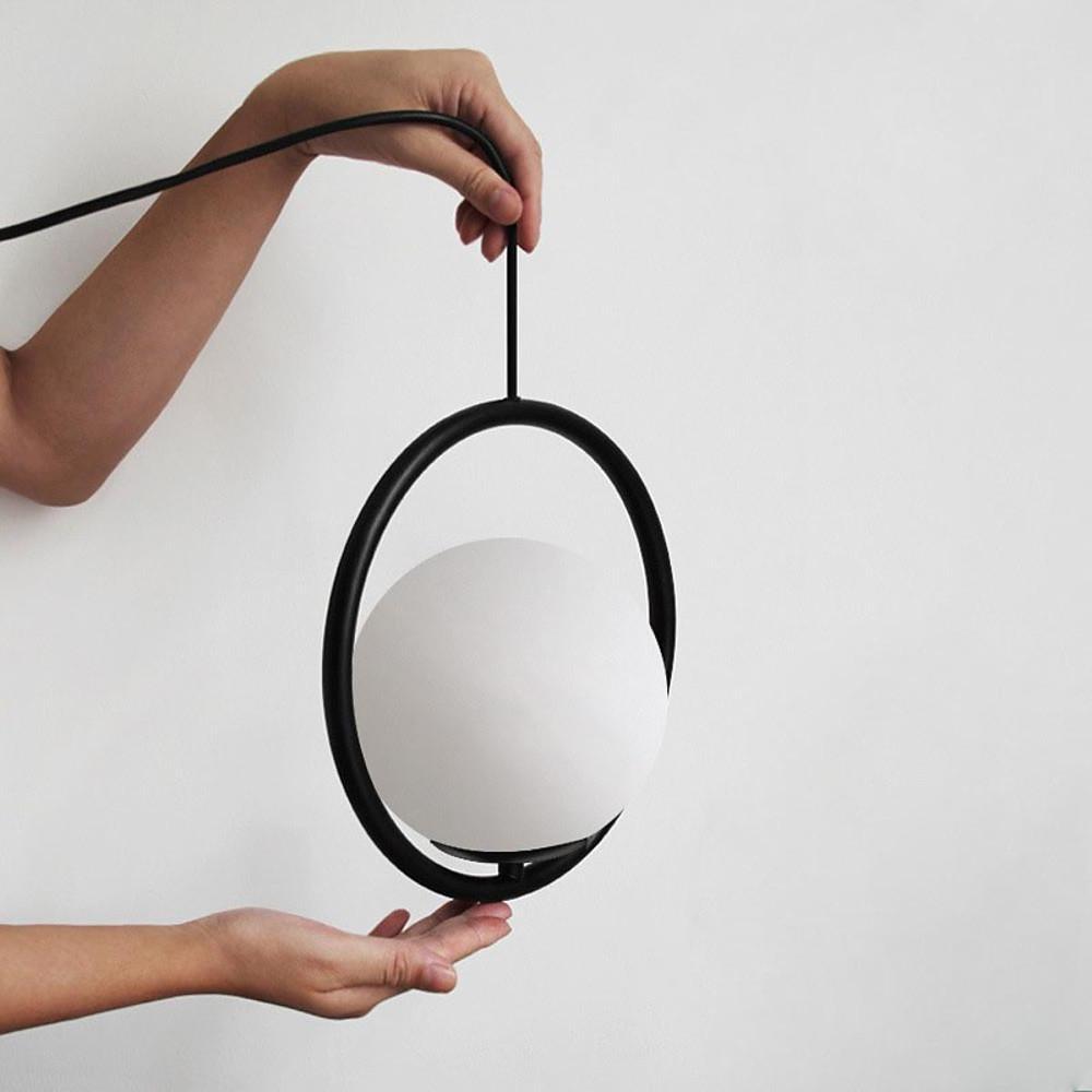 Aurelia Glass Globe Pendant Light in Matte Black Metal Ring