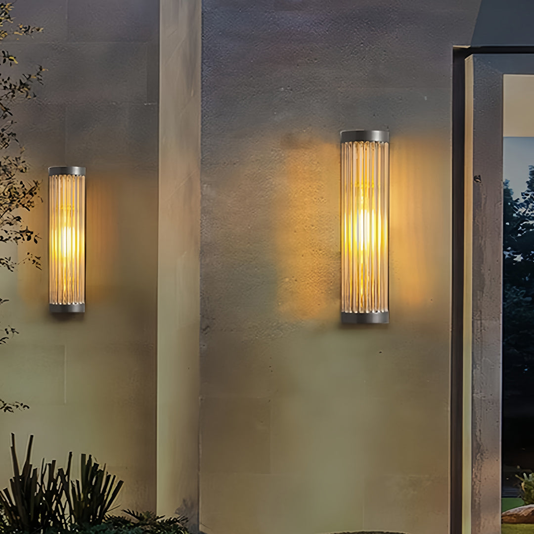 Cylinder Outdoor Wall Sconce in Stainless Steel with Warm LED Glow