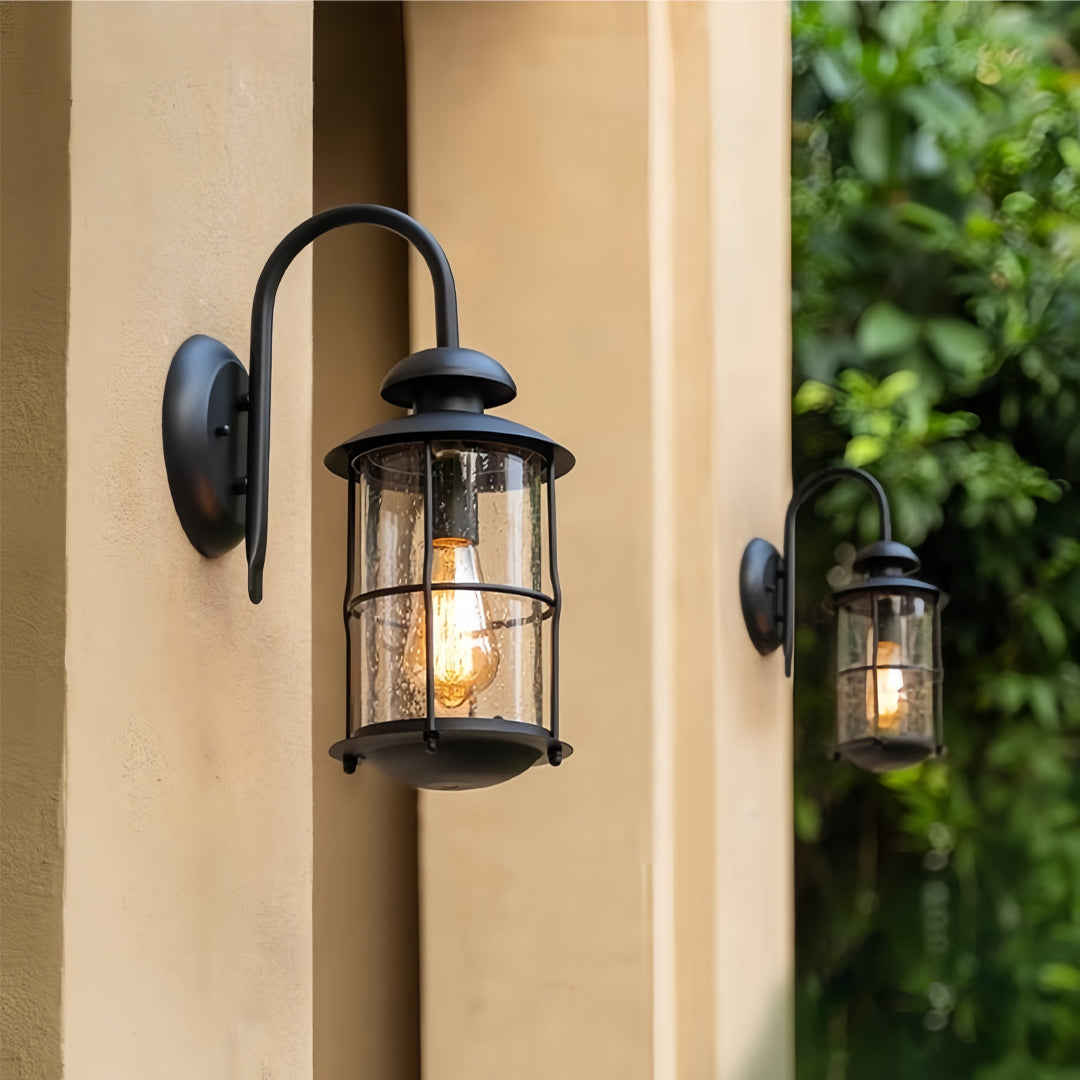 European Outdoor Wall Sconce with Clear Glass Shade in Black Aluminum
