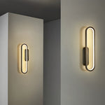 Modern Minimalist Oval LED Wall Sconce with Warm Ambient Glow