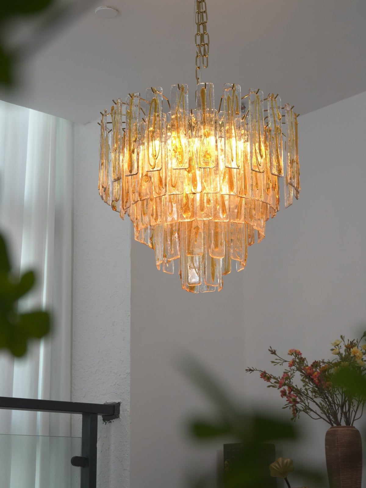 Amber Glass Chandelier with Brass Chain – Modern Luxury Lighting for Dining and Living Spaces