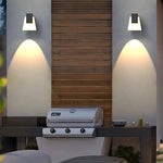 Geometric Outdoor Wall Sconce in Black Stainless Steel with Warm LED Light