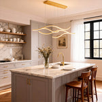 Wavy LED Pendant Light with Adjustable Height in Metallic Finishes
