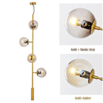 Aurora Linear Glass Globe Chandelier in Gold for Modern Dining Rooms