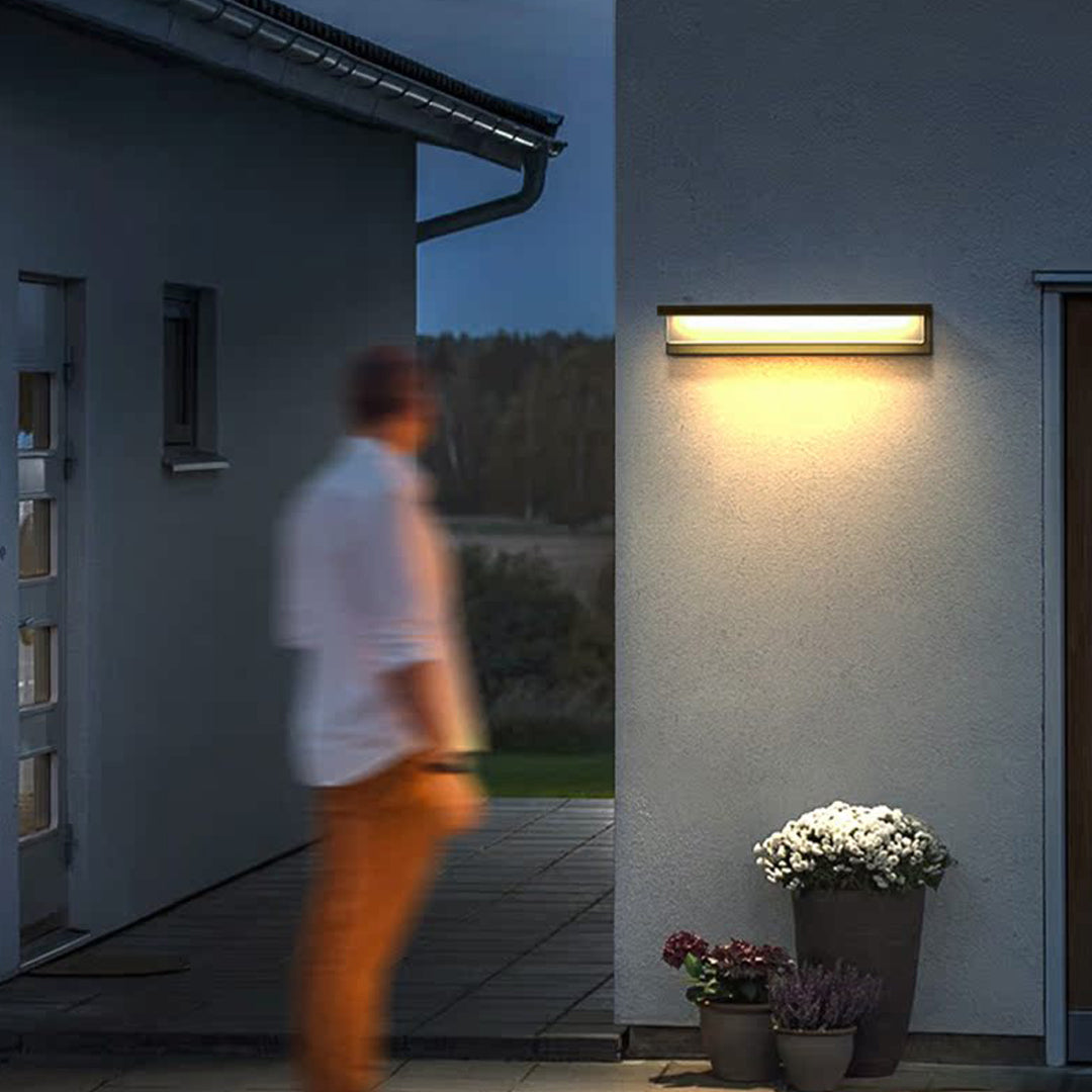 Modern Outdoor Wall Sconce with Black Stainless Steel and Warm LED Light