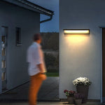 Modern Outdoor Wall Sconce with Black Stainless Steel and Warm LED Light