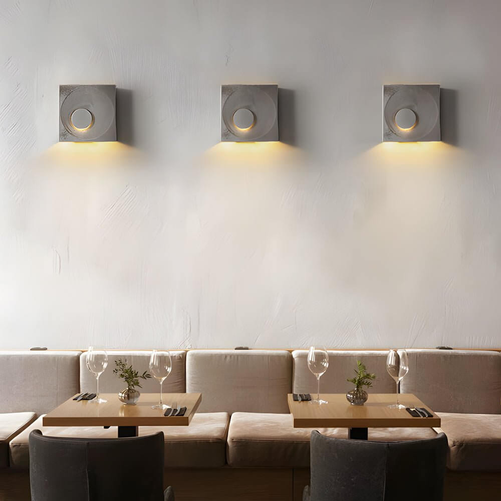 Eclipse Frosted Cement LED Wall Sconce for Modern Interiors