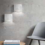 Eclipse Frosted Cement LED Wall Sconce for Modern Interiors