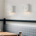 Eclipse Frosted Cement LED Wall Sconce for Modern Interiors