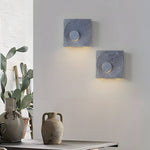 Eclipse Frosted Cement LED Wall Sconce for Modern Interiors