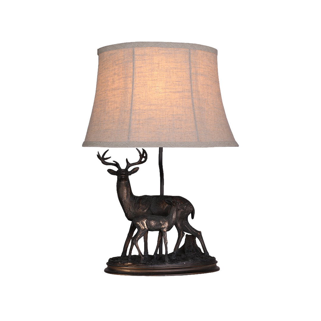 Sculpted Deer Table Lamp with Bronze Finish and Beige Linen Shade