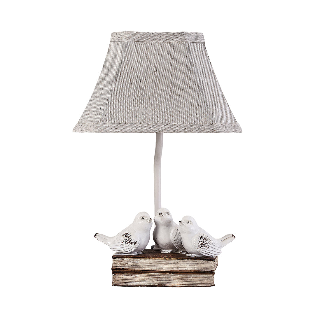 French Perched Bird Table Lamp on Stacked Books, Beige Fabric Shade
