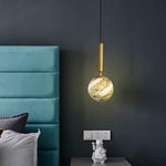 Celestial Globe Pendant Light in Distressed Metal and Acrylic