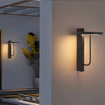 Aria Outdoor Wall Sconce in Black Stainless Steel with Warm LED Glow