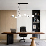 Linear Modern Chandelier with Six Glass Globes for Dining and Living Spaces