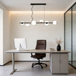 Linear Modern Chandelier with Six Glass Globes for Dining and Living Spaces