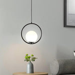Aurelia Glass Globe Pendant Light in Matte Black Metal Ring