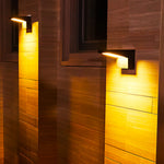 Aria Solar Wall Sconce — Modern Outdoor Lighting in Black Aluminum