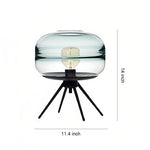 Nordic Glass Table Lamp with Four-Legged Iron Base for Modern Interiors