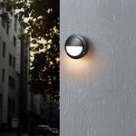 Minimalist Round Outdoor Wall Sconce with Integrated LED