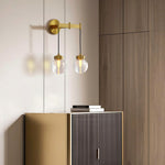 Modern Wall Sconce with Clear Glass Shade in Copper, Chrome, or Black