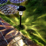 Retro Modern Solar LED Stake Lights in Glass and Stainless Steel for Pathways and Gardens
