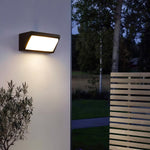 Solar-Powered Minimalist Outdoor Wall Sconce in Sand Black Aluminum