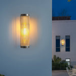 Cylinder Outdoor Wall Sconce in Stainless Steel with Warm LED Glow