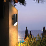 Modern Outdoor Up and Down Wall Sconce in Black Stainless Steel with Clear Glass