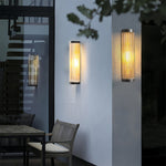 Cylinder Outdoor Wall Sconce in Stainless Steel with Warm LED Glow