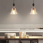 Artisan Iron and Glass Pendant Light with Warm Ambient Glow