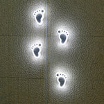 Solar-Powered Path Lights with Sculptural Footprint Design for Modern Gardens