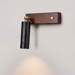 Event Horizon Adjustable Wall Sconce in Black Travertine and Brass