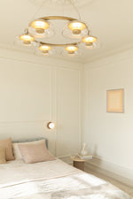Solara LED Chandelier in Brass and Glass for Modern Interiors