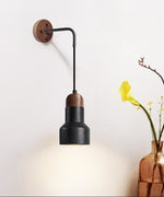 Vulkan Drop Wall Sconce in Black Travertine and Walnut