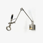 Precision Beam Adjustable Chrome Wall Sconce for Modern Interiors