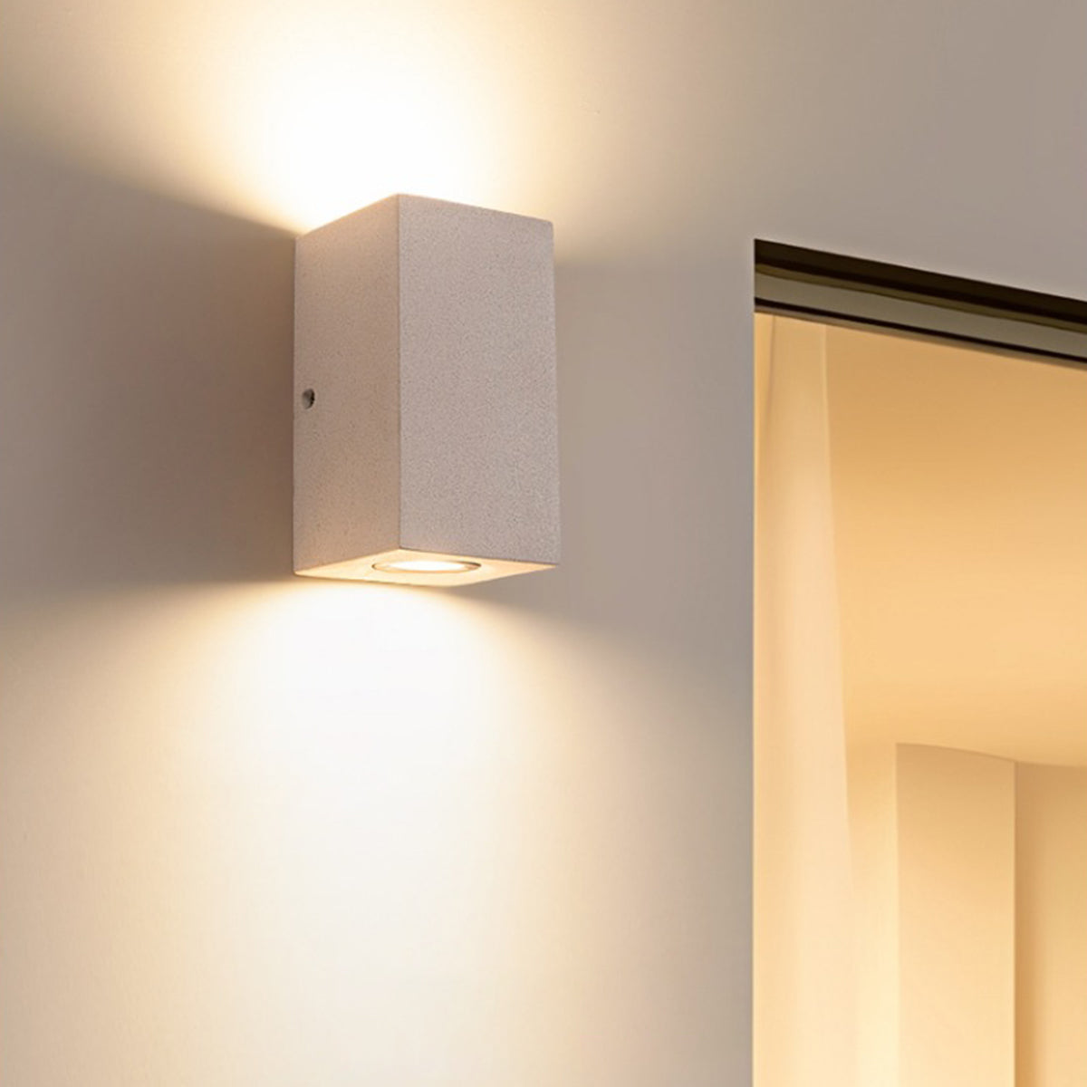 Terrazzo Outdoor Up and Down Wall Light in Black or White