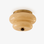 Curvaceous Flush Mount Ceiling Light with Gold Accents and Glass Shade