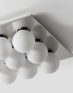 Lumo Cluster Ceiling Light – Nine Glass Orbs in Chrome