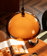 Amber Dome Pendant Light with Walnut Accents – Modern Retro Illumination