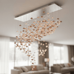 Lure Linear LED Chandelier in Gold and Clear Glass for Modern Interiors